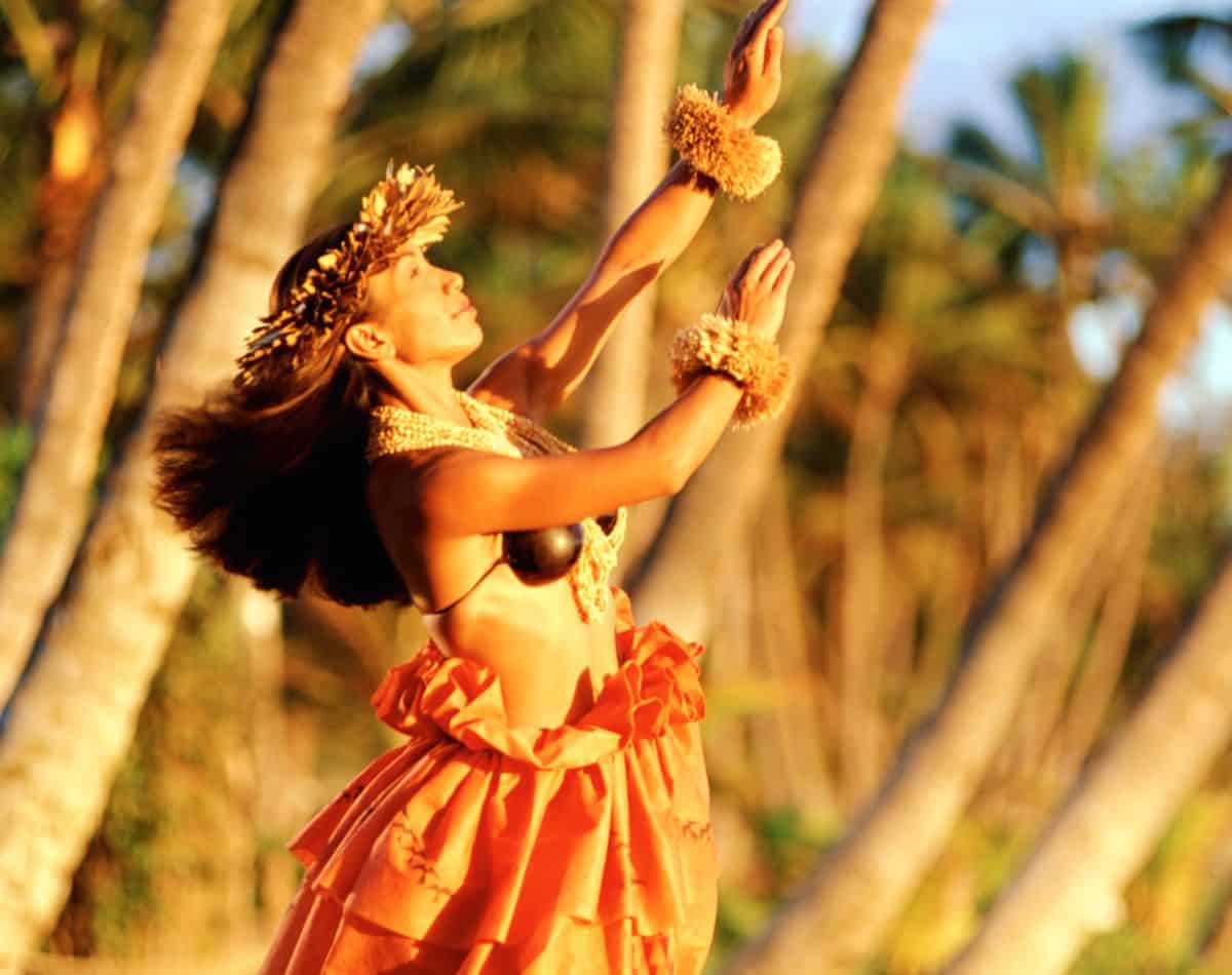 hula dancer on the beach in hawaii.
