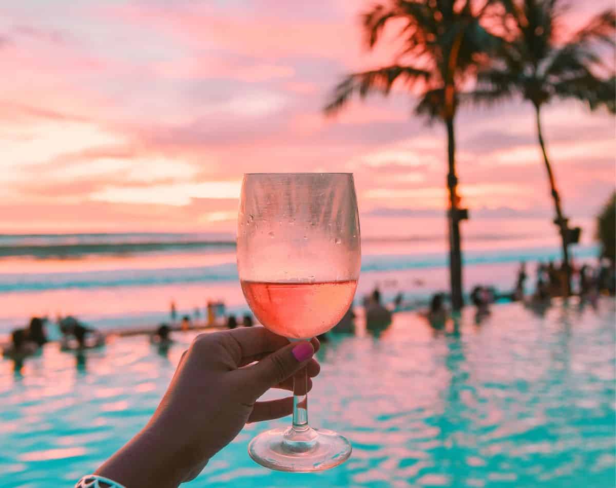 sunset and a cocktail in hawaii.